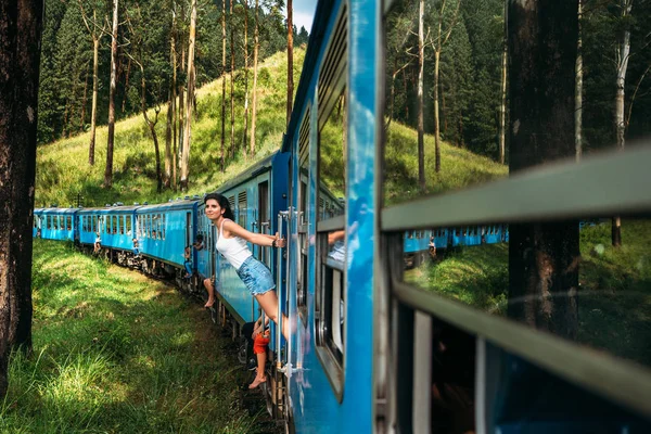 depositphotos_316874018-stock-photo-travel-train-girl-travels-train