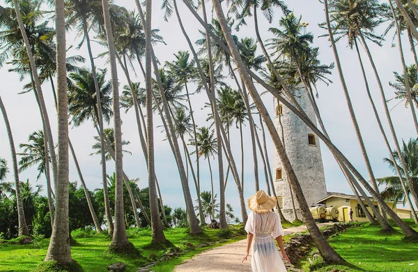 depositphotos_455914256-stock-photo-girl-sri-lanka-island-lighthouse