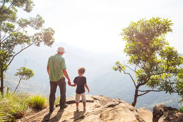 depositphotos_566629140-stock-photo-father-son-cliff-sri-lanka